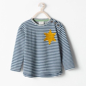 Pijama infantil da Zara foi retirado do catálogo após queixas sobre semelhanças com uniforme usado por judeus em campos de concentração, durante a Segunda Guerra Mundial
