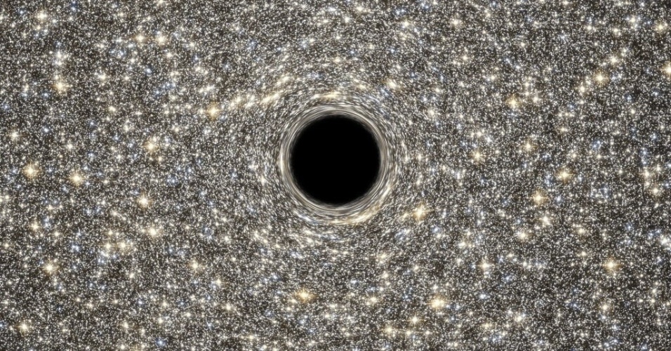 18.set.2014 - Representação artística divulgada pela ESA (agência espacial europeia) mostra um buraco negro supermassivo localizado no centro da galáxia M60-UCD1. O buraco pesa 21 milhões de vezes mais que a massa do Sol. Apesar de ser uma galáxia pequena, localizada a 50 milhões de anos-luz de distância, ela tem 140 milhões de estrelas