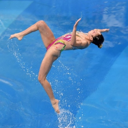 Nadadora norte-coreana compete no nado sincronizado durante os Jogos Asiáticos 2014 - Philippe Lopez/AFP