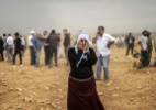Estado Islâmico: Jovens ocidentais são atraídos para o terrorismo na Síria e Iraque - Bulent Kilic/AFP