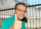 Henrique Eduardo Alves faz sinal de positivo antes de votar, em Natal - Brunno Antunes/Elevesn/Estadão Conteúdo