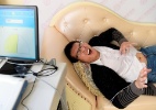 Na China, homens experimentam as dores do parto - Guo Xulei/Xinhua