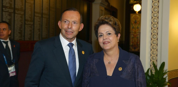 O primeiro-ministro da Austrália, Tony Abbott, recebe a presidente Dilma Rousseff durante a abertura da cúpula, que tem como objetivo soluções para temas como estabilidade econômica, regulação fiscal e crescimento sustentável - Steve Christo/Efe