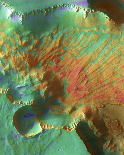 3.dez.2014 - Deslizamentos de material são encontrados em cânions de Marte. Com a curadoria de artistas, fotógrafos e editores de fotografia, a Nasa reuniu uma série de imagens para compor a 