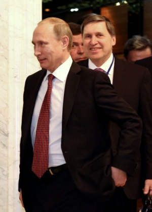 Vladimir Putin, presidente da Rússia, deixa salão de reunião que trata da crise com a Ucrânia em Minsk, capital de Belarus - Sergei Gapon/AFP