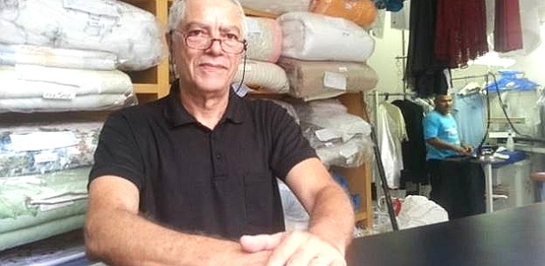 Aberta há 33 anos, a lavanderia de Renato Soares em São Paulo já passou por toda sorte de dificuldades - Ruth Costas/BBC