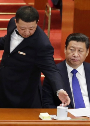 Críticos questionaram a decisão de Xi Jinping de romper uma tradição que pede por uma parada militar apenas uma vez a cada década - Jason Lee/Reuters