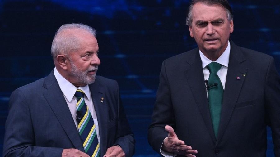 Jair Bolsonaro e Luiz Inácio Lula da Silva - 16.out.2022 - Nelson Almeida/AFP