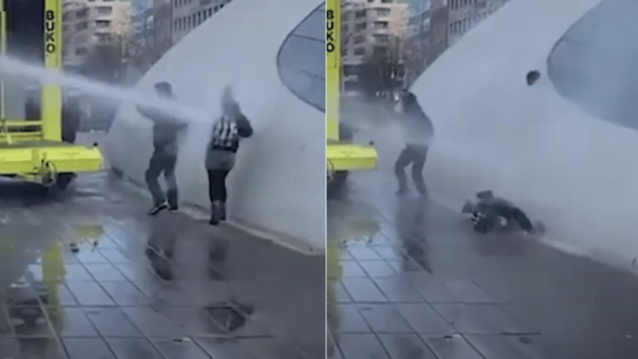 Momento em que Denisa é atingida por um canhão de água da polícia durante manifestação "anti-lockdown" na Holanda - Reprodução/YouTube/The National