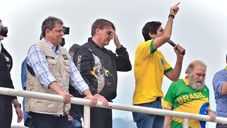 O presidente Jair Bolsonaro (sem partido) durante "motociata" (passeio de moto) no Rio de Janeiro - Saulo Ângelo/Futura Press/Estadão Conteúdo