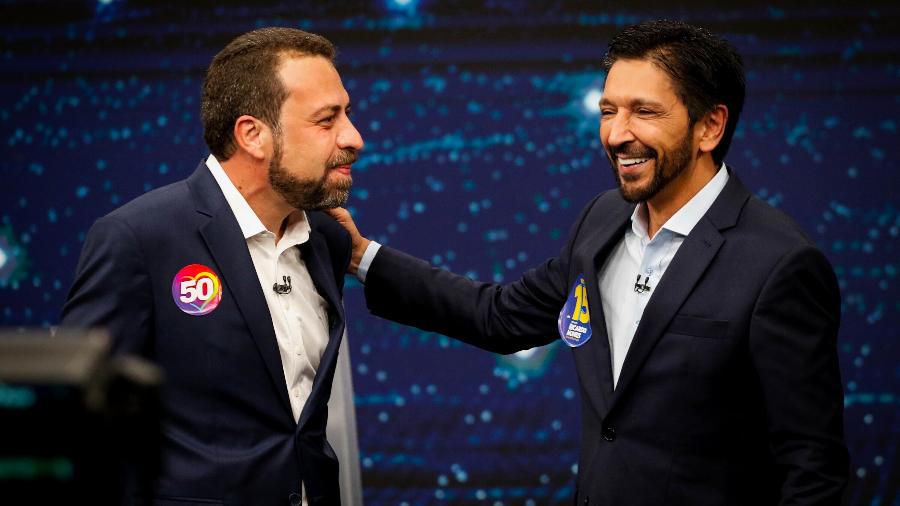 Ricardo Nunes e Guilherme Boulos se abraçam durante debate da Band - 14.out.2024-Aloisio Mauricio/Fotoarena/Estadão Conteúdo