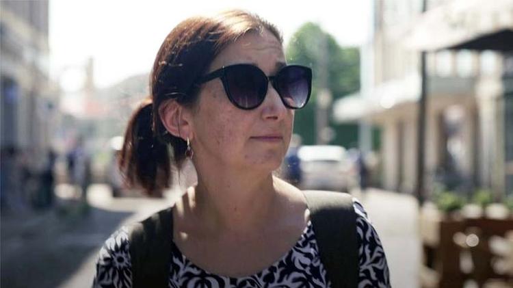 Tatyana is an experienced volunteer who has worked with orphaned children for years - BBC - BBC