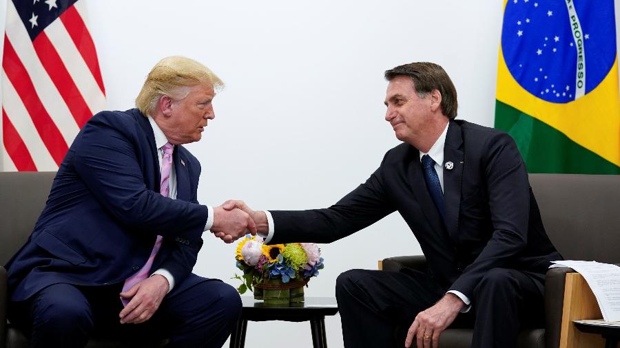 Presidente dos Estados Unidos, Donald Trump, e o presidente brasileiro Jair Bolsonaro em encontro bilateral no G20, no Japão - Kevin Lamarque/Reuters