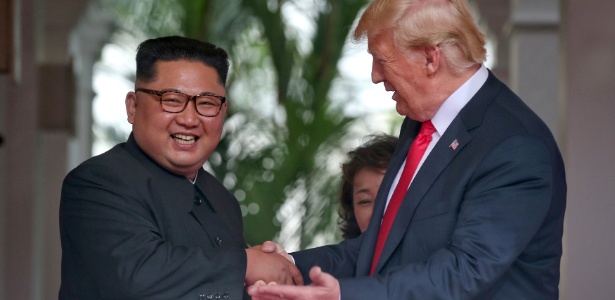 Kim e Trump, durante reunião em junho - Kevin Lim/The Straits Times via Reuters