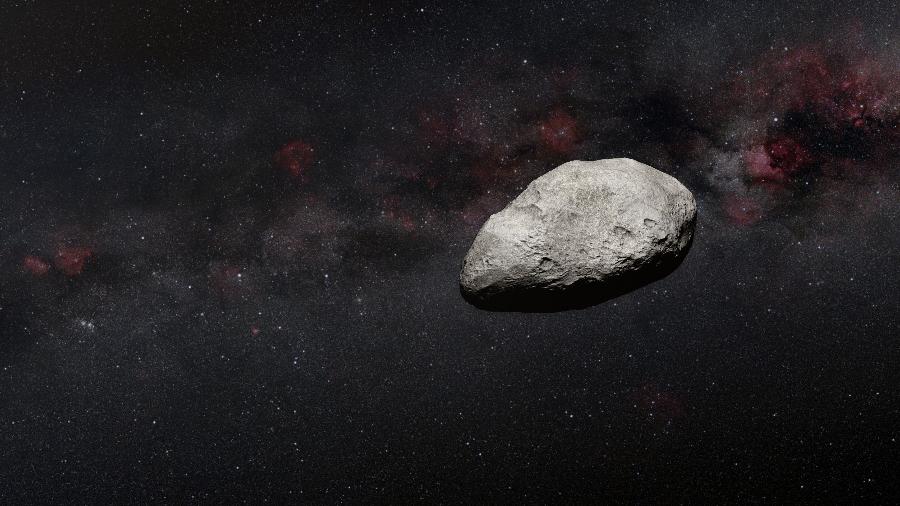 Impressão artística feita pela ESA (Agência Espacial Europeia) de asteroide que deve passar entre Terra e Lua neste sábado (25 de março) - Divulgação/ESA/AFP