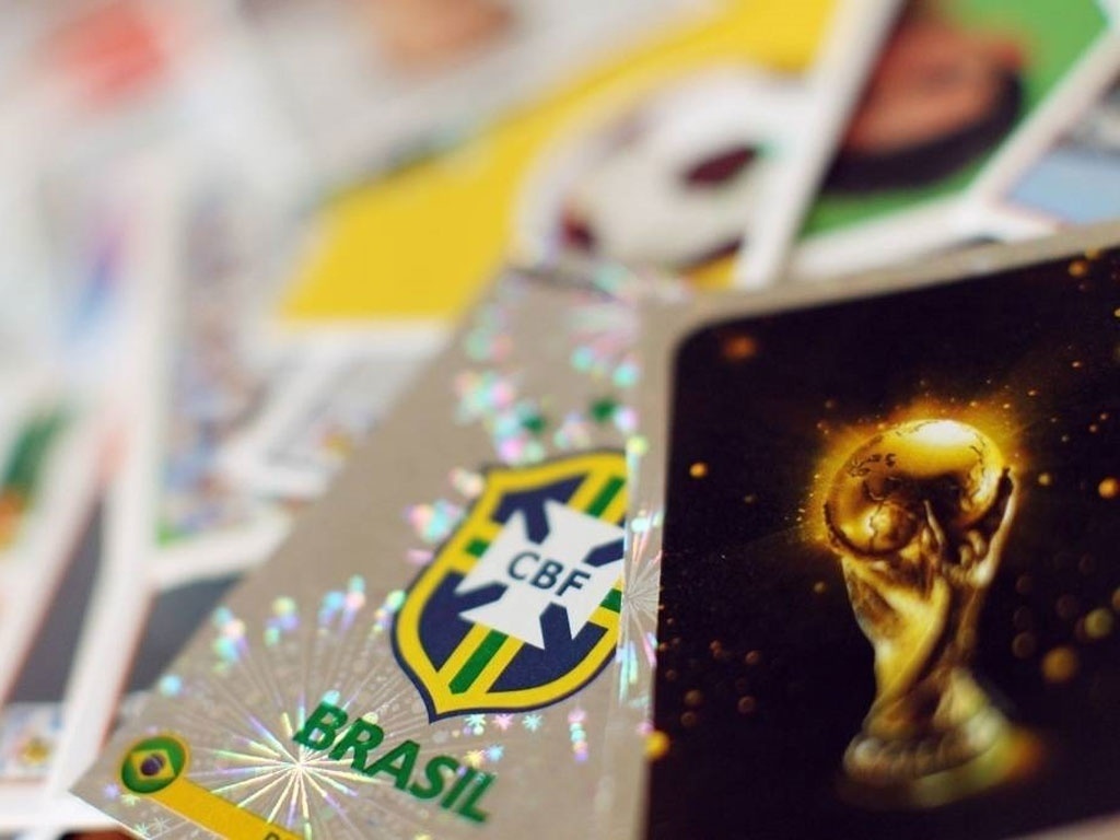 Empreendedores criam álbum da Copa personalizável, no qual