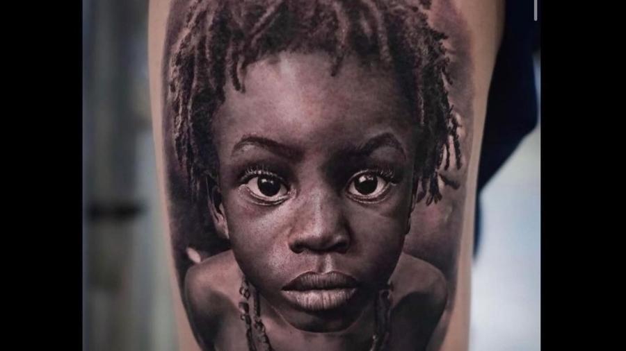 Foto de menino de quatro anos foi tatuada em braço de homem em São Bernardo do Campo; tatuador não pediu autorização - Neto Coutinho Tattoo/Reprodução de Instagram