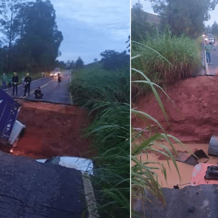 29.jan.2020 - Veículos são engolidos por cratera após estrada ceder em Minas Gerais, devido às fortes chuvas - Corpo de Bombeiros de Minas Gerais