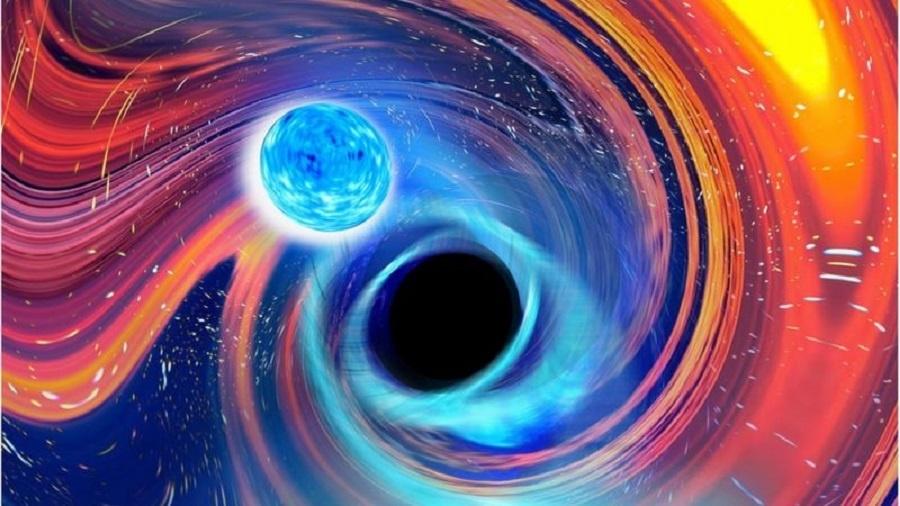 Impressão artística de uma estrela de nêutrons caindo em um buraco negro - CARL KNOX/OZGRAV