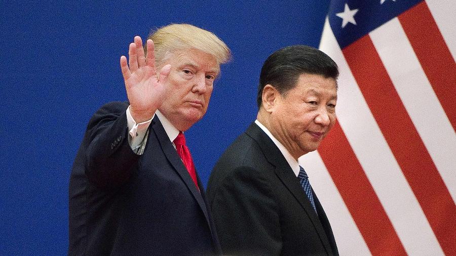 Os presidentes dos Estados Unidos e da China, Donald Trump e Xi Jinping - Nicolas Asfouri/AFP