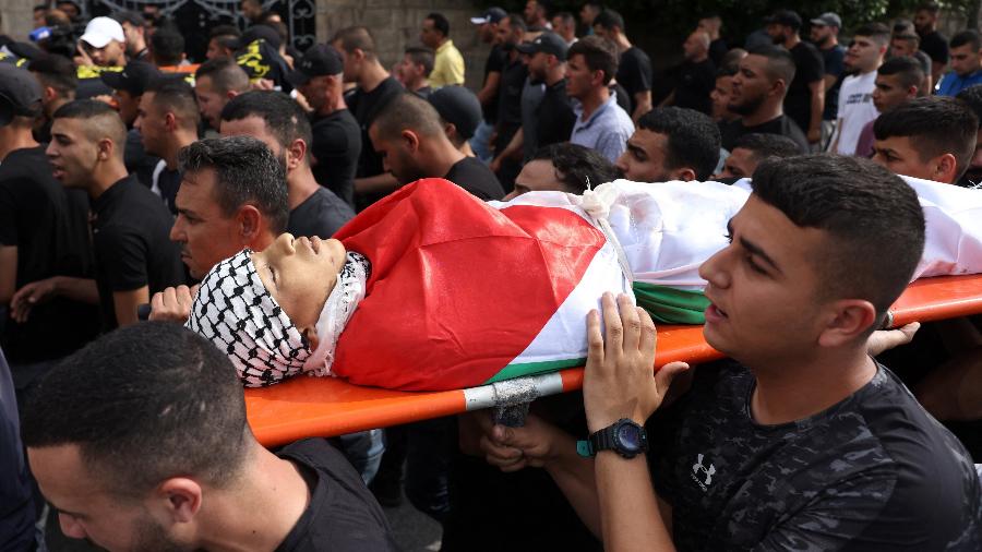 Ataque com um helicóptero de combate deixou ao menos quatro palestinos mortos, entre eles um adolescente, e mais de 60 pessoas feridas. - RONALDO SCHEMIDT / AFP