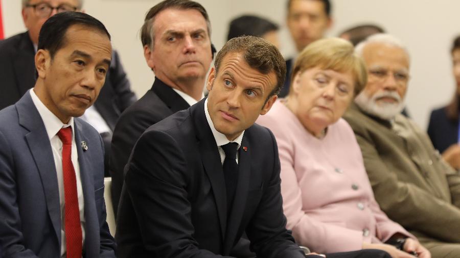 Macron e Bolsonaro no G20 - Dominique JACOVIDES/POOL/AFP