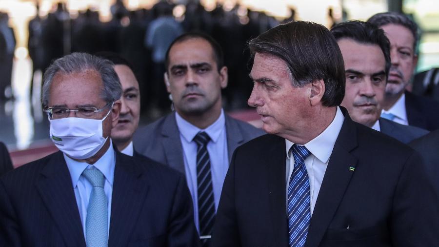 O ministro da Economia, Paulo Guedes, ao lado do presidente Jair Bolsonaro (sem partido) - Gabriela Biló/Estadão Conteúdo
