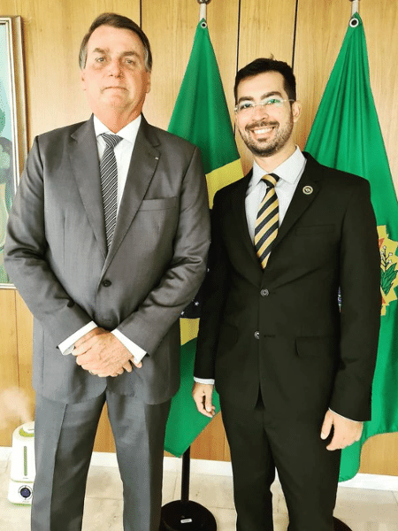 Rogério Cupti, assessor de Carlos Bolsonaro na Câmara do Rio, e Jair Bolsonaro (PL) - Reprodução - Reprodução