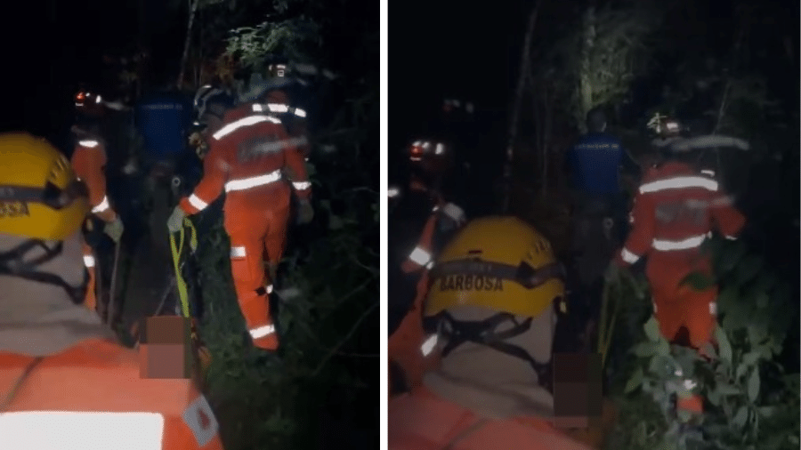 Bombeiros resgatando corpo em trilha em MG