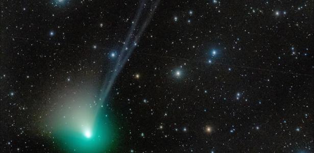 The comet reappears in the sky after 50,000 years.  Why is it green
