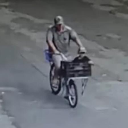 Câmeras de segurança registraram pai e filho em bicicleta momentos antes do crime