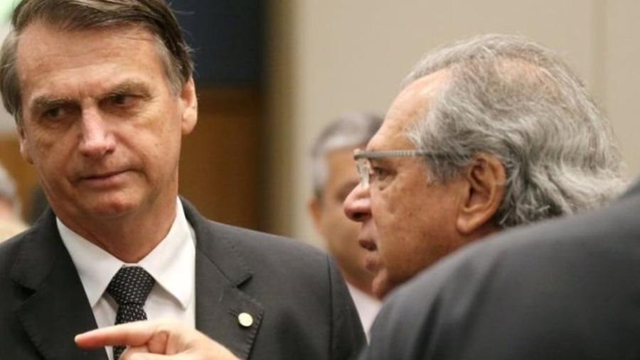 Paulo Guedes com o presidente Jair Bolsonaro - SERGIO MORAES/REUTERS