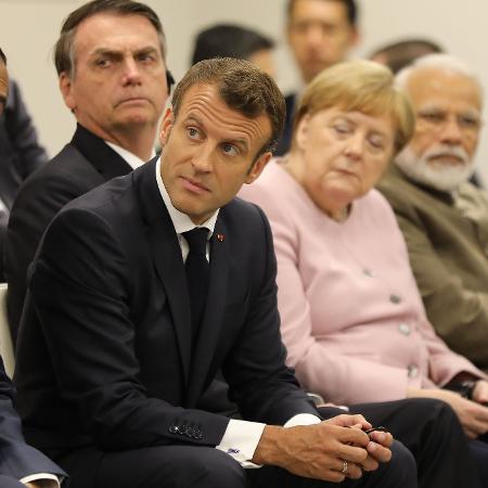 Macron e Bolsonaro no G20 - Dominique JACOVIDES/POOL/AFP