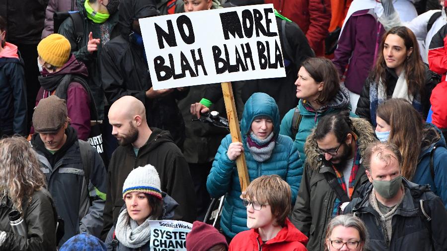 6 de novembro de 2021 - manifestantes fazem protesto em Glasgow, no Reino Unido, durante a COP26 - Andy Buchanan/AFP