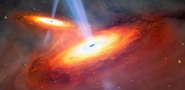 Sem querer e inédito: astrônomo acha 2 poderosos buracos negros em colisão