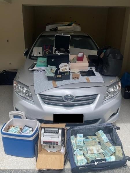 Dinheiro e objetos apreendidos em operação da PF contra deputado e ex-senador