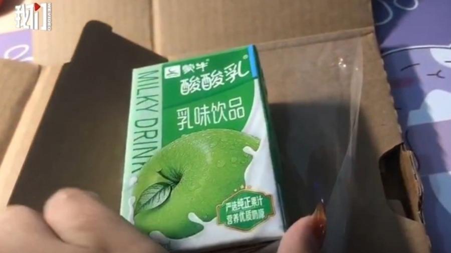 Uma mulher ligou para a polícia depois que recebeu um iogurte em vez de um iPhone 12 - Reprodução/Weibo