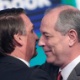 17.ago.2018 - Os candidatos à Presidência Ciro Gomes (PDT) e Jair Bolsonaro (PSL) se cumprimentam antes do início do debate eleitoral promovido pela RedeTV!/IstoÉ, em São Paulo - Paulo Whikater/Reuters