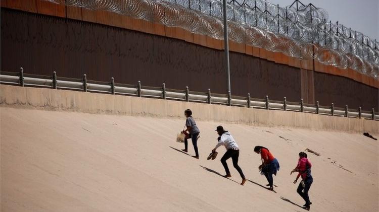 Some fences are reinforced with barbed wire, especially in urban areas - Reuters - Reuters