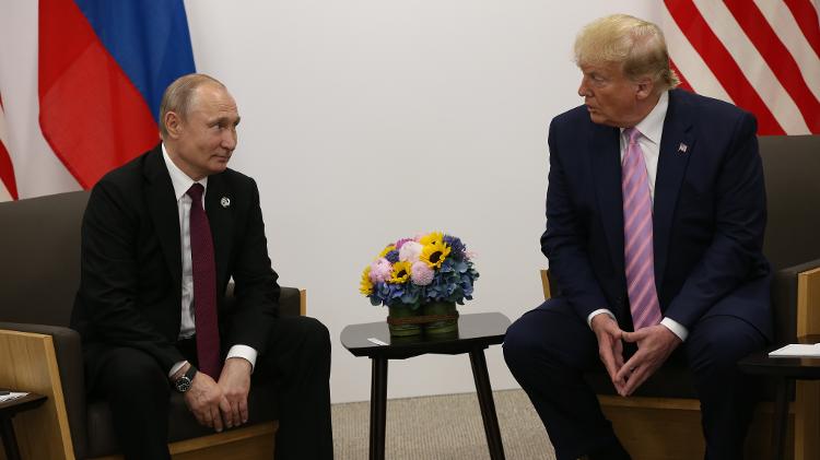 Vladimir Putin e Donald Trump em junho de 2019