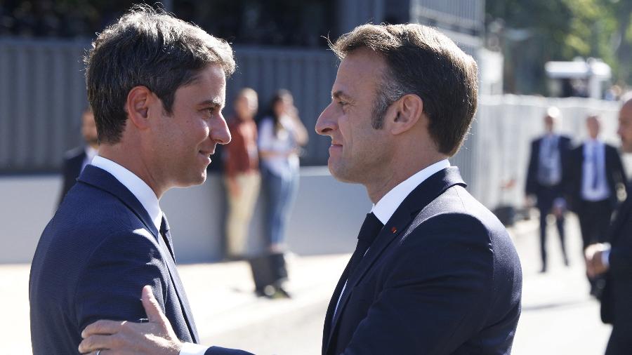 14.jul.2024 - O primeiro-ministro Gabriel Attal e o presidente Emmanuel Macron durante cerimônia em comemoração à Queda da Bastilha, na França