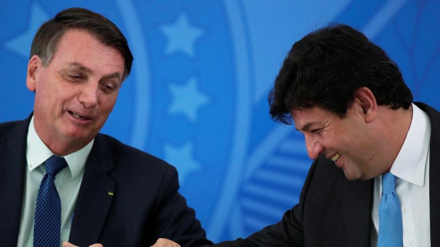 O presidente Jair Bolsonaro e o ex-ministro da Saúde Luiz Henrique Mandetta - UESLEI MARCELINO/REUTERS