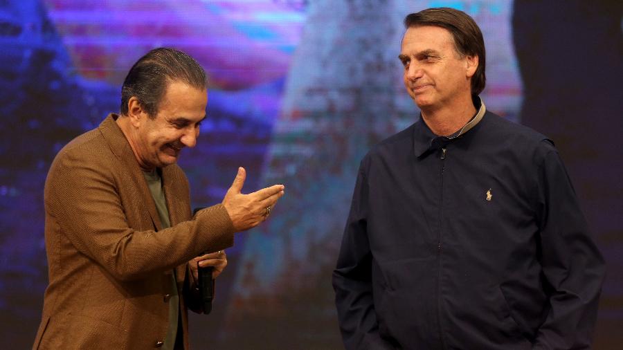 O pastor Silas Malafaia e o presidente Jair Bolsonaro em culto no Rio em 2018 - Wilton Junior - 30.out.2018/Estadão Conteúdo