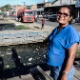 3.fev.2017 - Elilde Bezerra, 43, é camelô no bairro da Levada. Ela reclama que, com a falta de saneamento, os esforços contra o mosquito da Dengue são em vão. "Não adianta cuidar da minha casa e ter esse esgoto correndo na porta? - Beto Macário/UOL