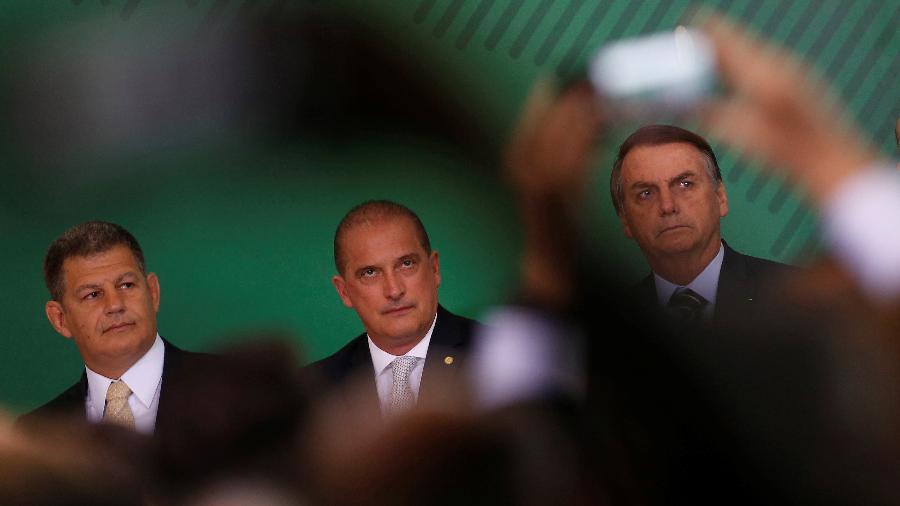 Bebianno (e), o ministro da Casa Civil, Onyx Lorenzonî (c), e Bolsonaro - Adriano Machado/Reuters