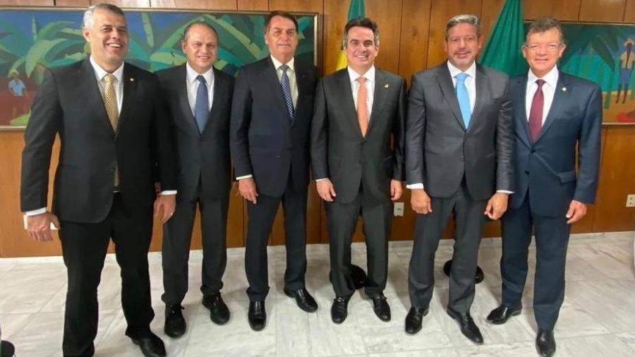 O presidente Jair Bolsonaro (sem partido) em almoço com aliados do PP. Parte da bancada é suspeita de envolvimento em corrupção. - Arthur Lira/Reprodução
