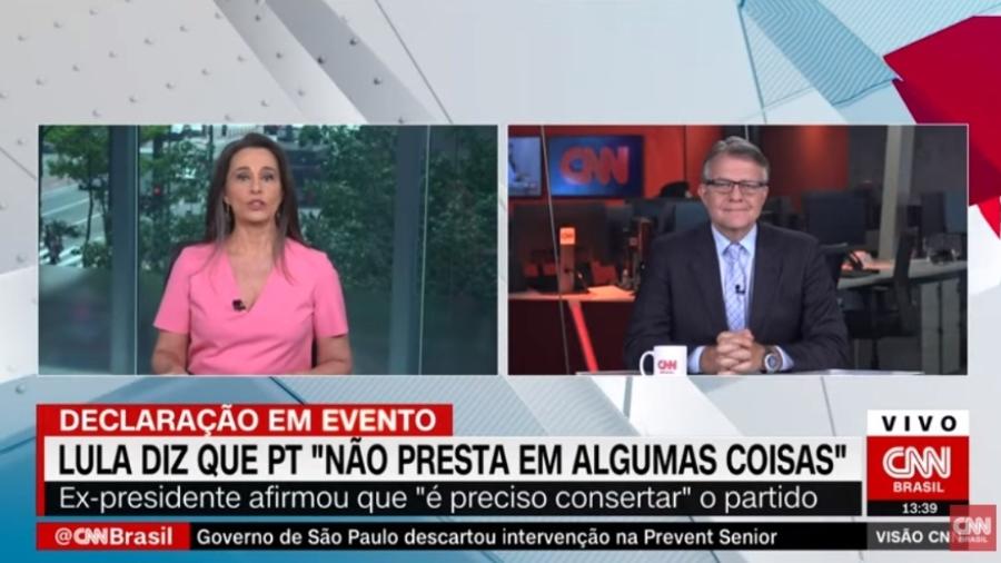 A apresentadora Carla Vilhena e o cientista político Ricardo Caldas, comentarista da TV Brasil - Reprodução