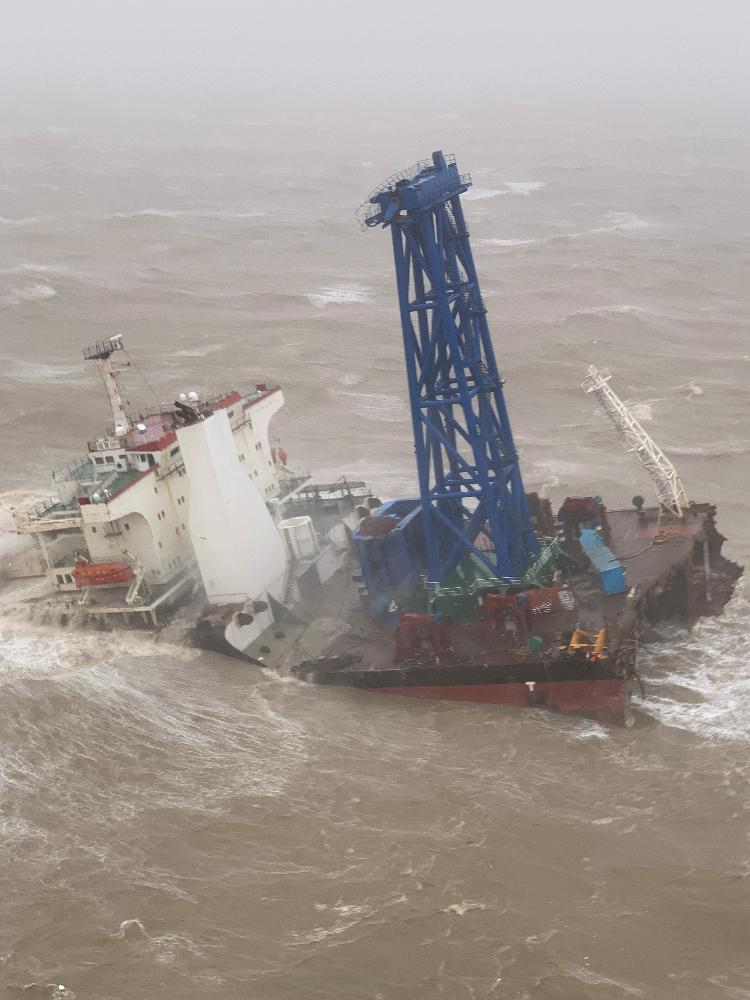 Jul 02.22 - A ship is seen sinking after Tropical Storm Chaba broke through off the coast of Hong Kong, China, according to officials - HONG KONG GOVERNMENT FLIGHT SERVICE/VIA REUTERS - HONG KONG GOVERNMENT FLIGHT SERVICE /VIA REUTERS