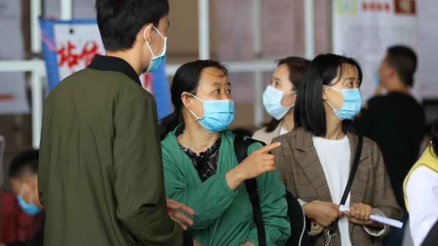 Novos surtos estão pressionando a estratégia rígida da China - Yang Bo/China News Service via Getty Images