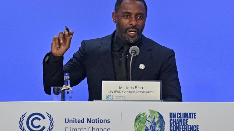 Embaixador da Boa Vontade do Fundo Internacional para o Desenvolvimento Agrícola (FIDA), o ator inglês Idris Elba, participa de uma sessão na COP26 - Paul ELLIS / AFP - Paul ELLIS / AFP